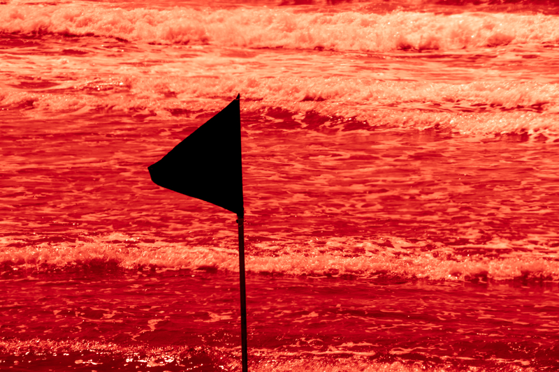 Black Flags Spain Spain's Coasts Under Fire: "Black Flags" for 48 Beaches Reveal Alarming Environmental Issues